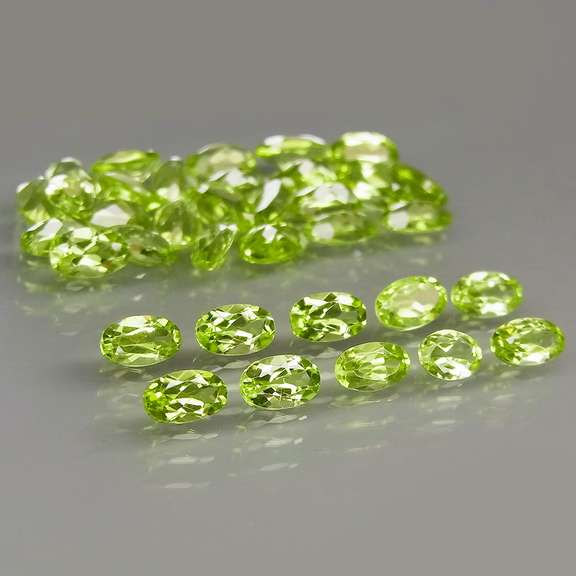 Real 8.55ct untreated apple green Peridot set