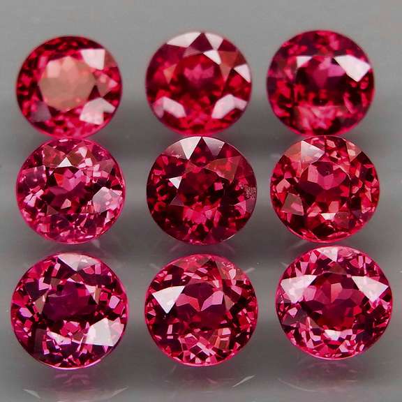 Ravishing 10.94ct cherry pink Rhodolite Garnet set