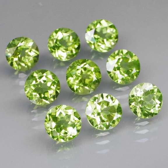 High grade 8.25ct untreated apple green Peridot set