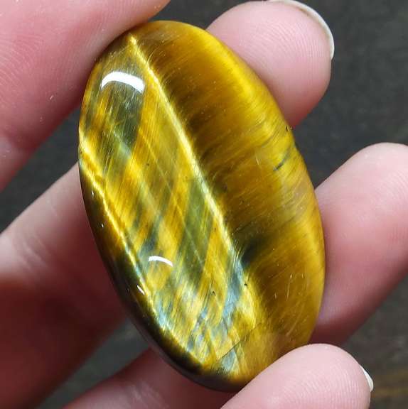 Dramatic 58.26ct Tiger Eye cabochon