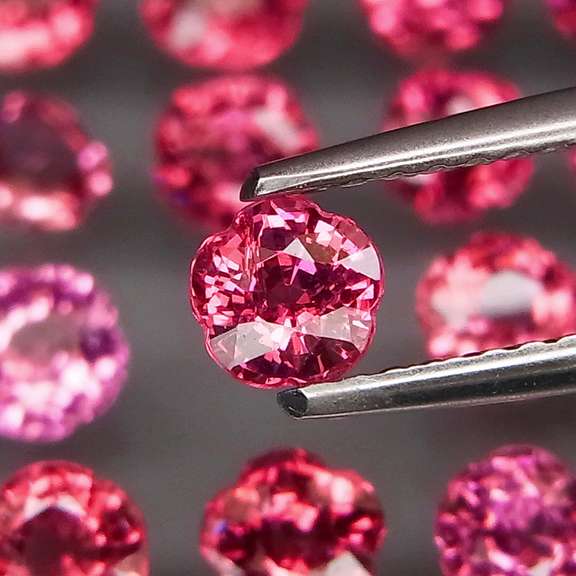 Ravishing 5.47ct violet pink flower shape Rhodolite Garnet set