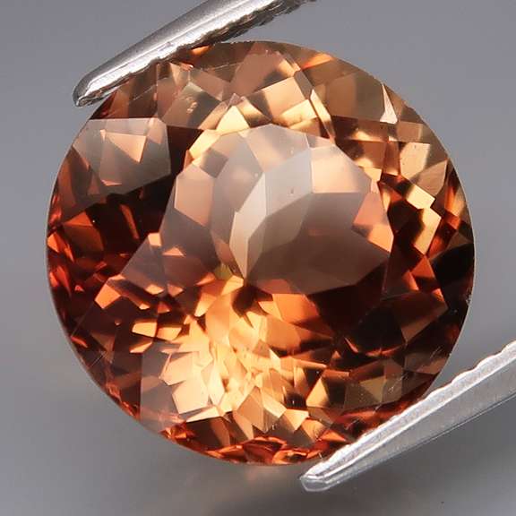 Impressive 8.14ct full fire Imperial Topaz solitaire