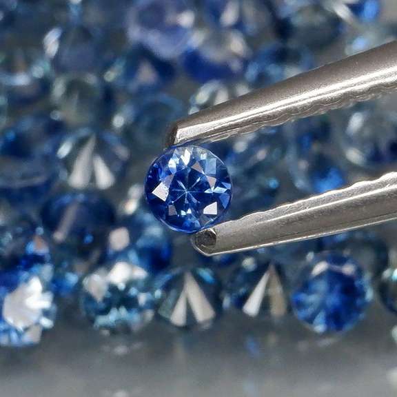 Rich blue 4.10ct diamond cut Sapphire set