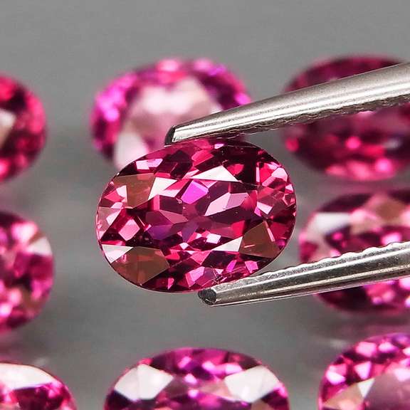 Remarkable 13.19ct violet pink Rhodolite Garnet set