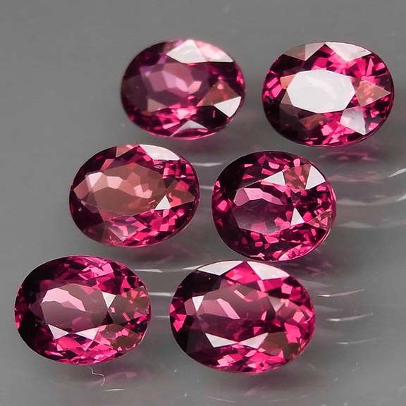 Amazing 9.90ct oval cut violet pink Rodolite Garnet set