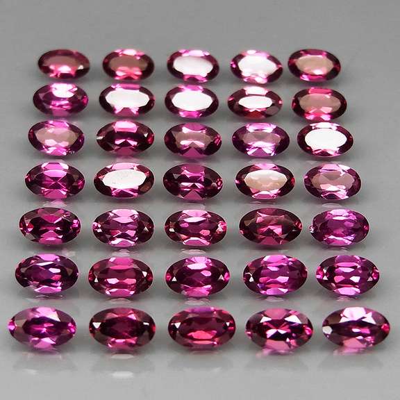 Ravishing 9.99ct violet Rhodolite Garnet set