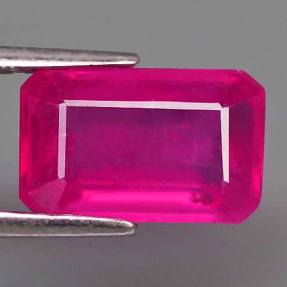 Top reddish pink 3.04ct emerald cut Ruby
