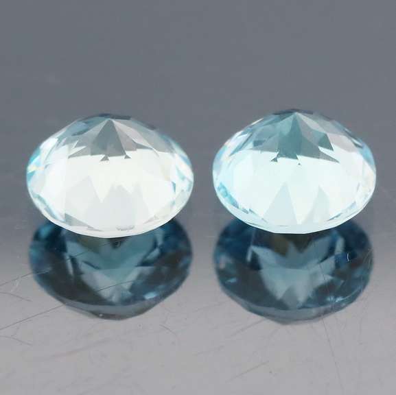 Heavy 4.56ct vivid sky blue Topaz set