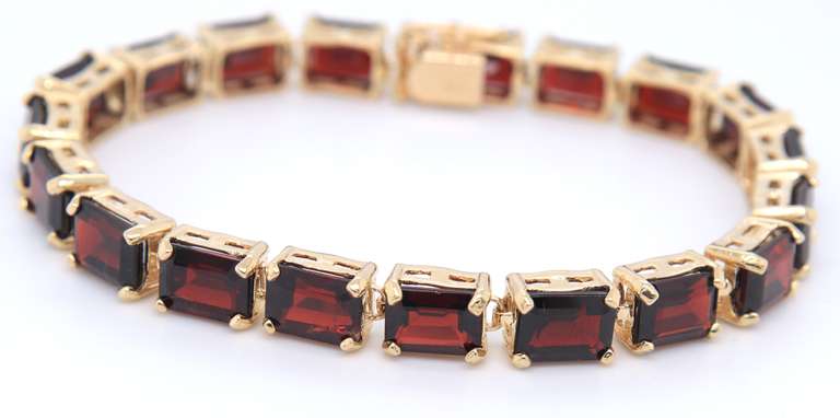 Majestic Yellow Gold Garnet Emerald Cut Bracelet