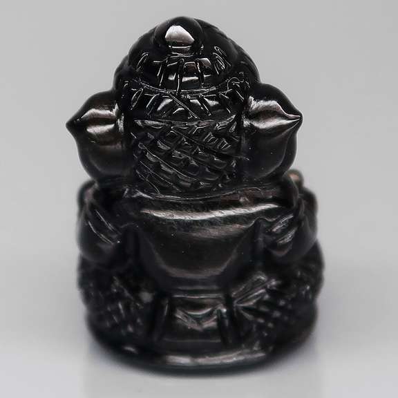 Detailed 26.25ct Tektite carving