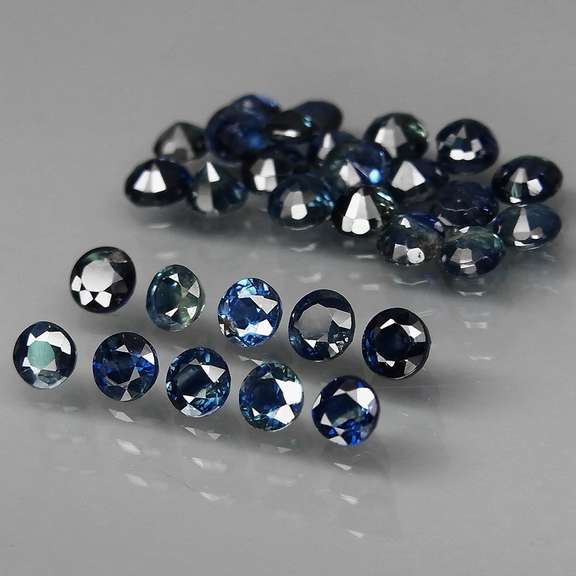 Heated only! 4.04ct blue green Sapphire set from