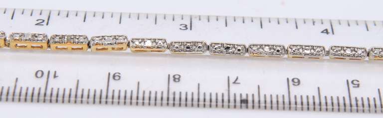 Sterling Silver Cubic Zirconia Bracelet with Tiny Heart Shaped Charm