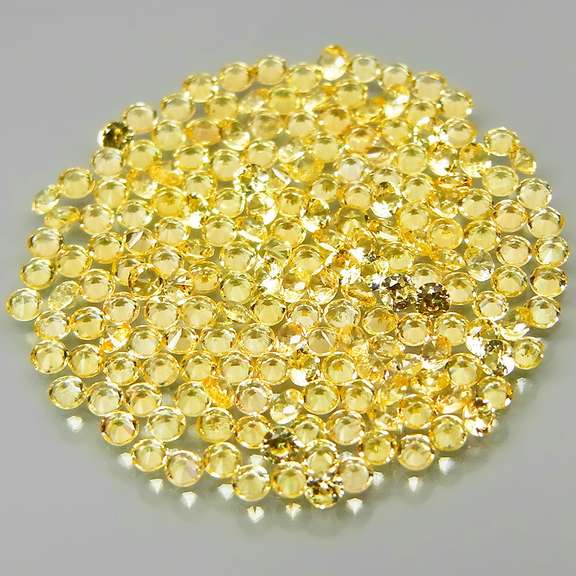 Fantastic 3.04ct diamond cut yellow Sapphire set