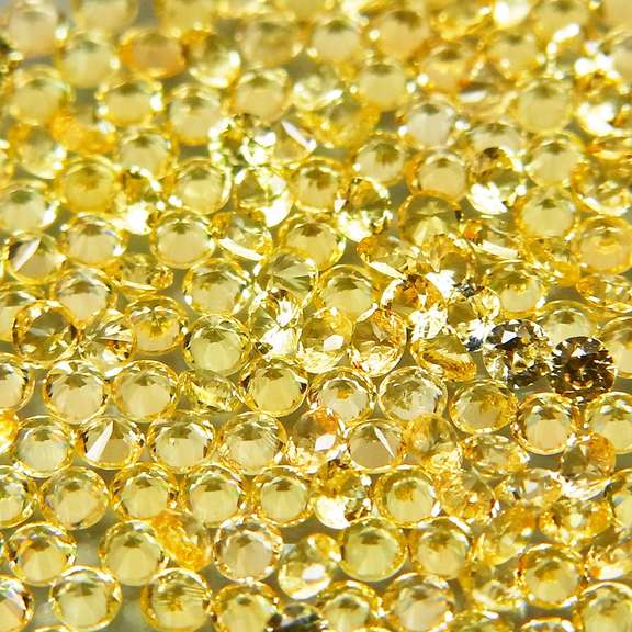 Fantastic 3.04ct diamond cut yellow Sapphire set