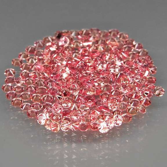 Diamond cut heated only 3.12ct peach Sapphire set