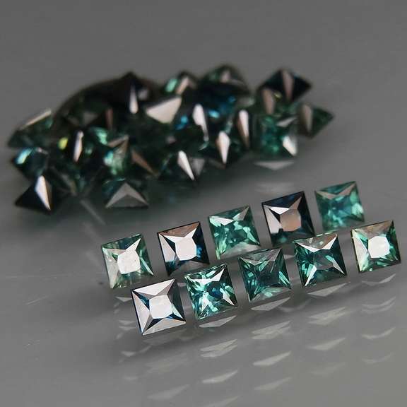 Vivid blue and green 5.13ct princess radiant cut Sapphire set
