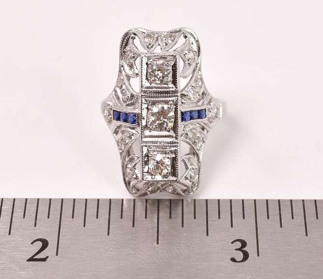 Fantastic Approx. 0.59CTW Diamond and 0.12CTW Sapphire Ring in Platinum