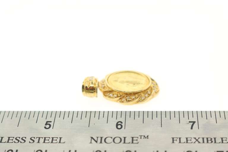 Radiant 18kt Gold Diamond Religious Pendant