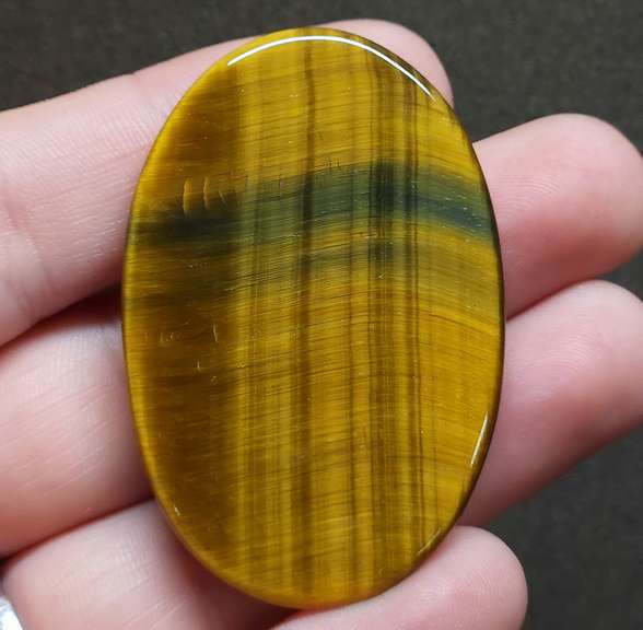 Mezmerizing 74.08ct Tigers Eye cabochon