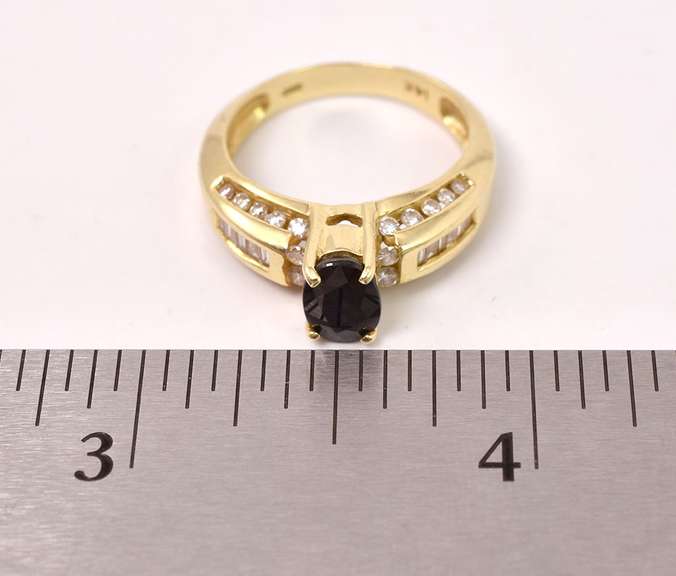 Excellent Sapphire and Diamond Ring in 14K Yellow Gold