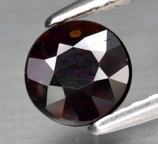 Rare! Glittering 1.31ct black cherry red Zircon