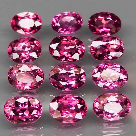 Remarkable 13.19ct violet pink Rhodolite Garnet set