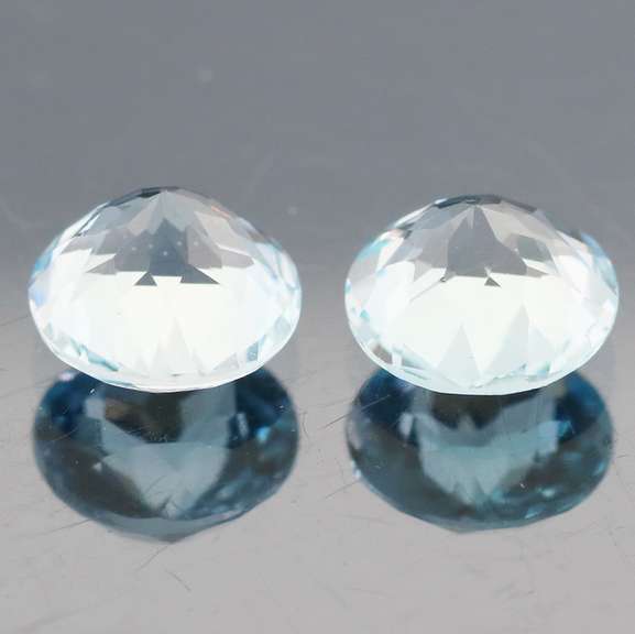 Matched 4.56ct pair of glittering sky blue Topaz