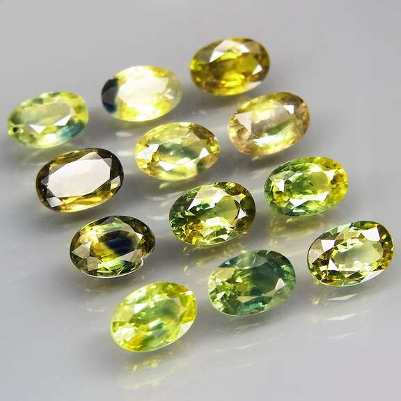 Glittering 7.69ct set of 12 multi-hue Songean Sapphires