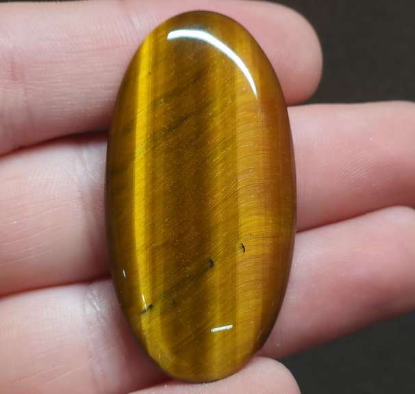 Full body shimmer! 41.94ct Golden Tiger Eye cabochon