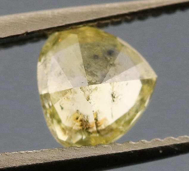 Amazing .28ct pear cut sultry yellow Diamond