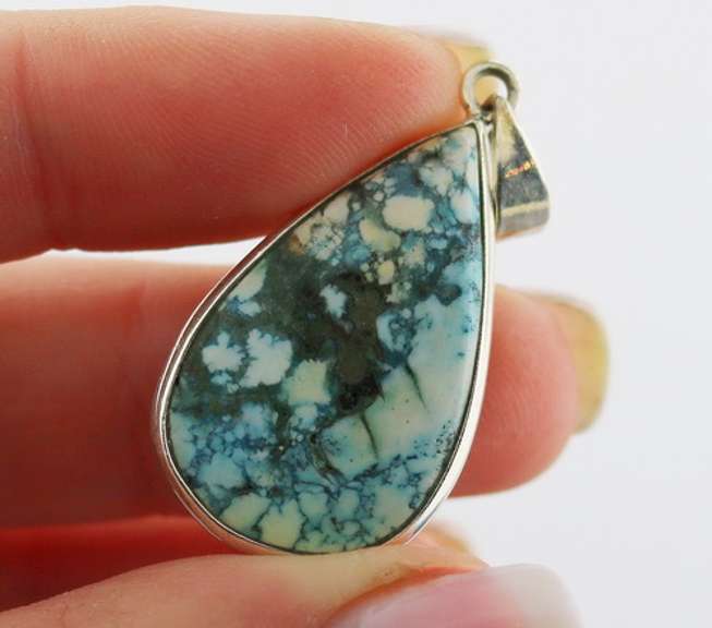 Beautiful 24.51ct pear shaped turquise pendant