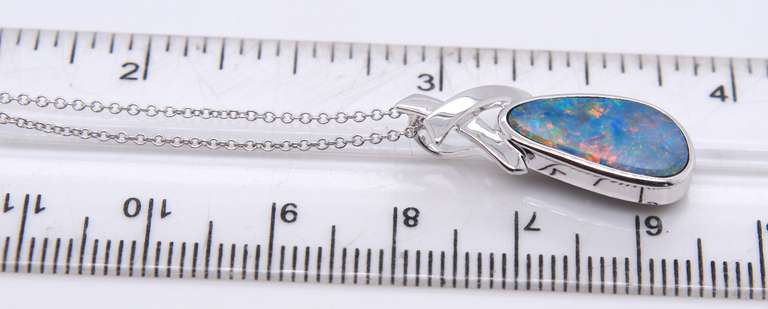Handsome White Gold Boulder Opal X Pendant on Chain