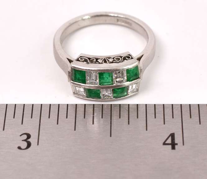 Tasteful Approx. 0.65CTS Emerald and 0.71CTS Diamond Ring in Platinum