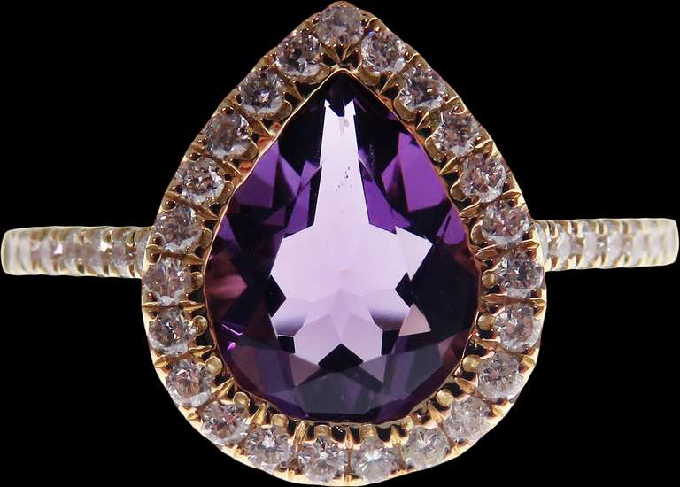 Intoxicating Violet Teardrop Amethyst 18k Gold Ring edged with Diamonds