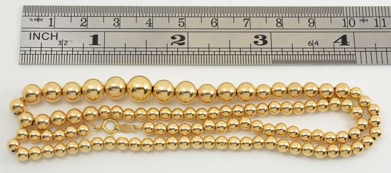 Sparkling Tapered Gold Bead Necklace