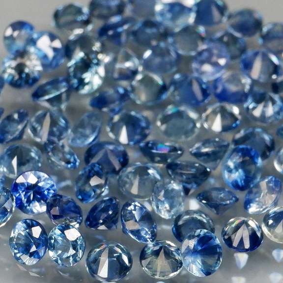 Rich blue 4.10ct diamond cut Sapphire set