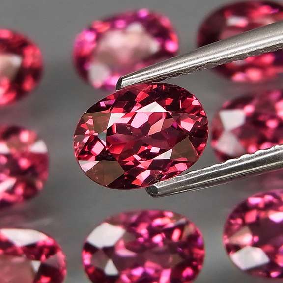 Ravishing 13.53ct violet pink Rhodolite Garnet set