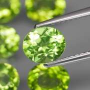 Ravishing 7.38ct untreated lime green Peridot set