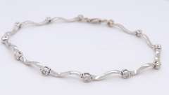 Elegant White Gold Diamond Station Wave Bracelet
