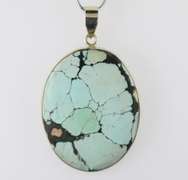 Striking well marbled 52.84ct Turquoise cabochon sterling pendant