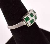 Tasteful Approx. 0.65CTS Emerald and 0.71CTS Diamond Ring in Platinum