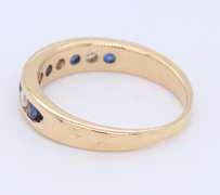 Dreamy Yellow Gold Sapphire and Diamond Channel Set Band