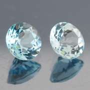 Matched 4.56ct pair of glittering sky blue Topaz