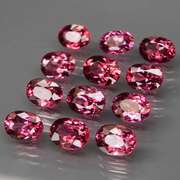 Ravishing 12.77ct violet pink Rhodolite Garnet set