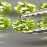 Dazzling 8.55ct untreated apple green Peridot set