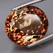Lavish 12.08ct high fire Imperial Topaz