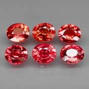Brightly colored 4.42ct Imperial red Sapphire set