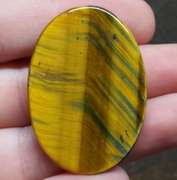 Dramatic 58.26ct Tiger Eye cabochon