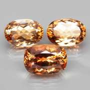 Matched! 3 piece 23.76ct full fire Imperial Topaz set