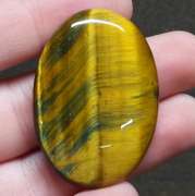 Dramatic 58.26ct Tiger Eye cabochon